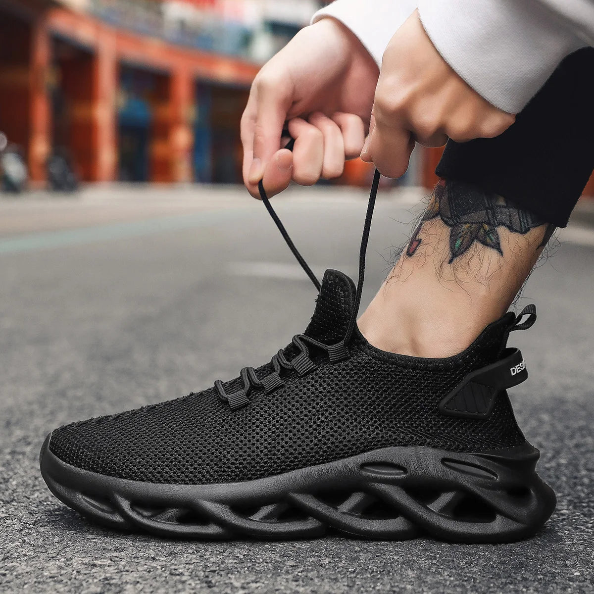 Zapatillas deportivas negras – ligeras y versátiles para hombre