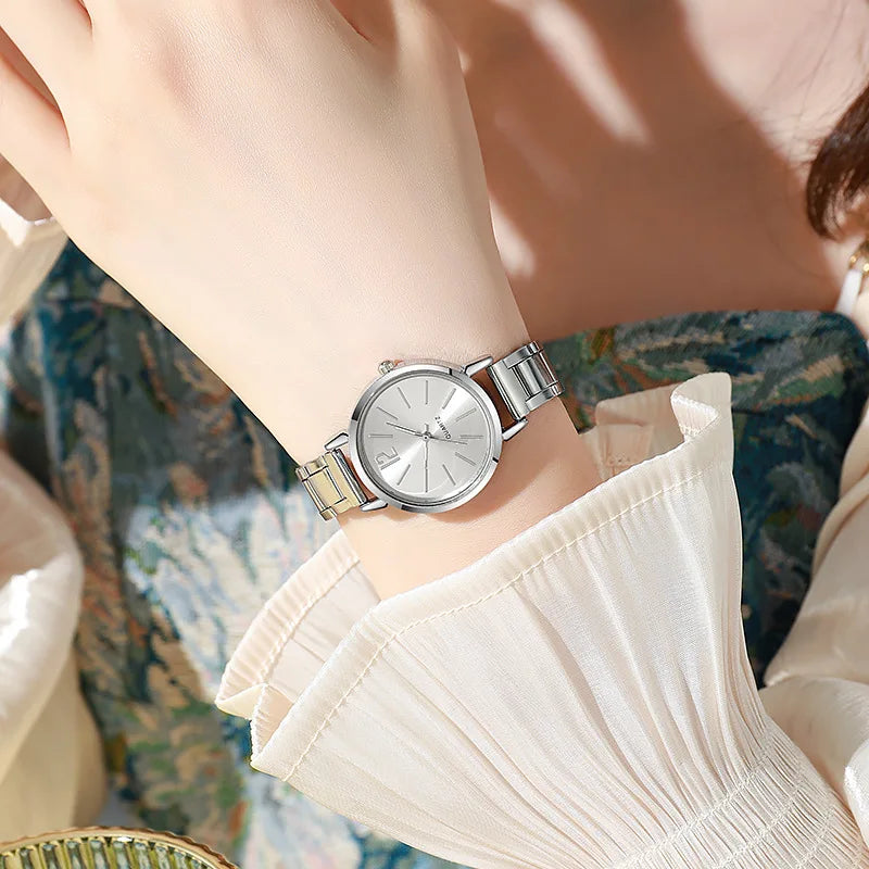 Reloj de lujo mujer – esfera redonda simple y pulsera dorada de acero inoxidable
