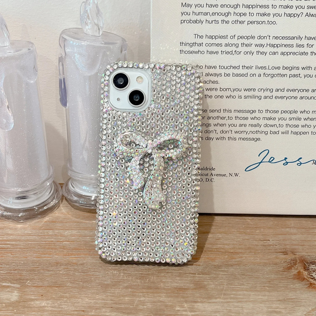 Funda full diamond con lazo para iPhone – protección brillante y adorable