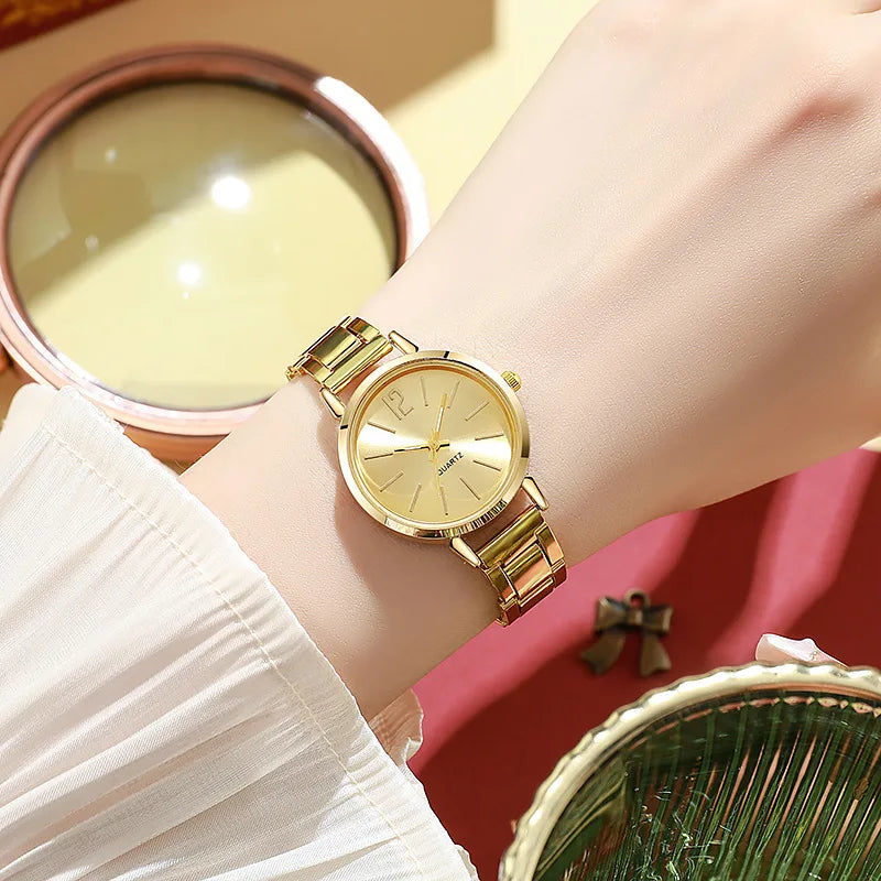 Reloj de lujo mujer – esfera redonda simple y pulsera dorada de acero inoxidable