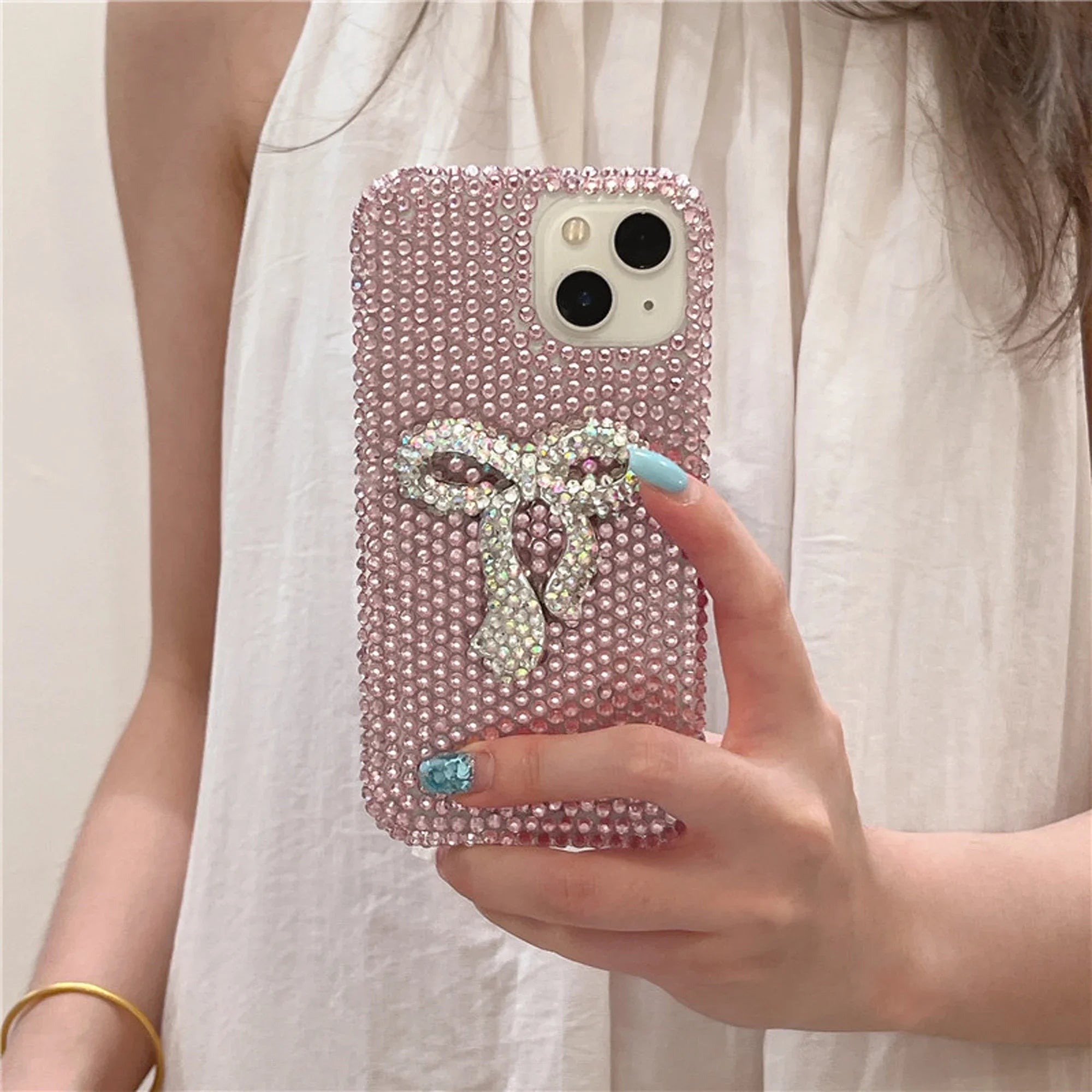 Funda full diamond con lazo para iPhone – protección brillante y adorable